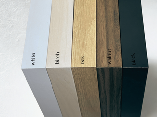 Frame color options for custom pressed wedding flower preservation, including white, birch, oak, walnut, and black finishes.