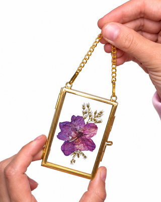 Pressed floral antique Christmas ornaments made from special event flowers such as funerals, weddings, and more. The perfect keepsakes from weddings and funerals. 