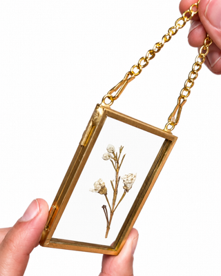 Pressed floral antique Christmas ornaments made from special event flowers such as funerals, weddings, and more. The perfect keepsakes and gifts for weddings and funerals. 