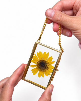 Pressed floral antique Christmas ornaments made from special event flowers such as funerals, weddings, and more. The perfect keepsakes from weddings and funerals. 