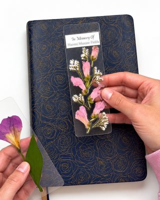 Pressed flower bookmark keepsake made from preserved funeral flowers with obituary included.